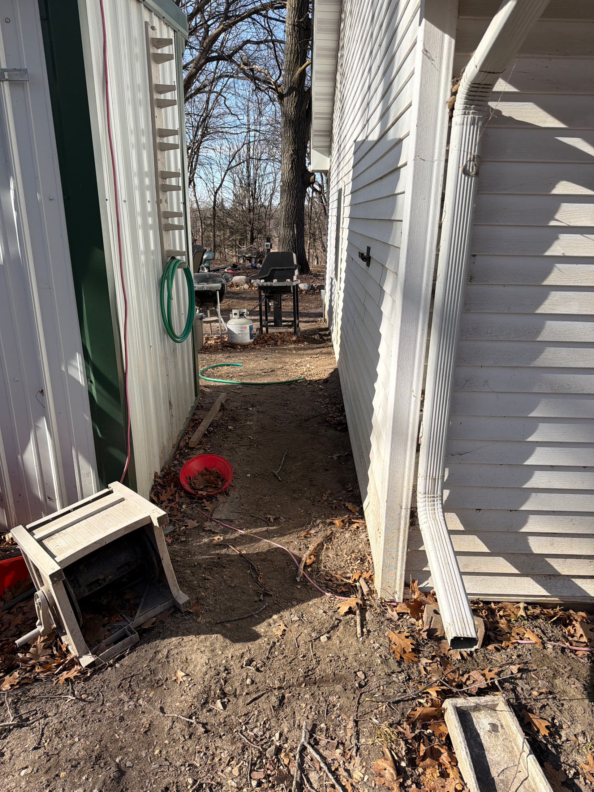 Gutter Downspout and French Drain Installation in Delano